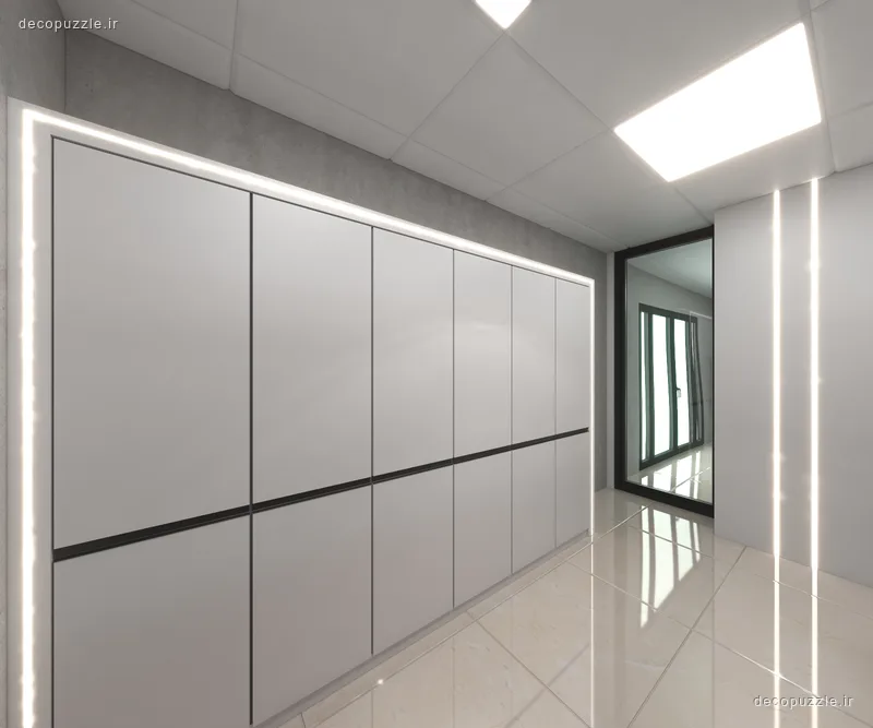دفتر کار مدرن با کابینت‌های سفید خطی، دیوارپوش طوسی و نورپردازی خطی در سقف و دیوار